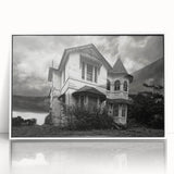 Art deco poster of a derelict building in muted gray and white tones, acrylic print framed in white.