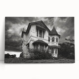 Black and white photograph of a dilapidated building on a large stretched canvas.