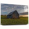 Large abstract wall art on acrylic glass depicting a derelict building, in subdued gray and blue tones.