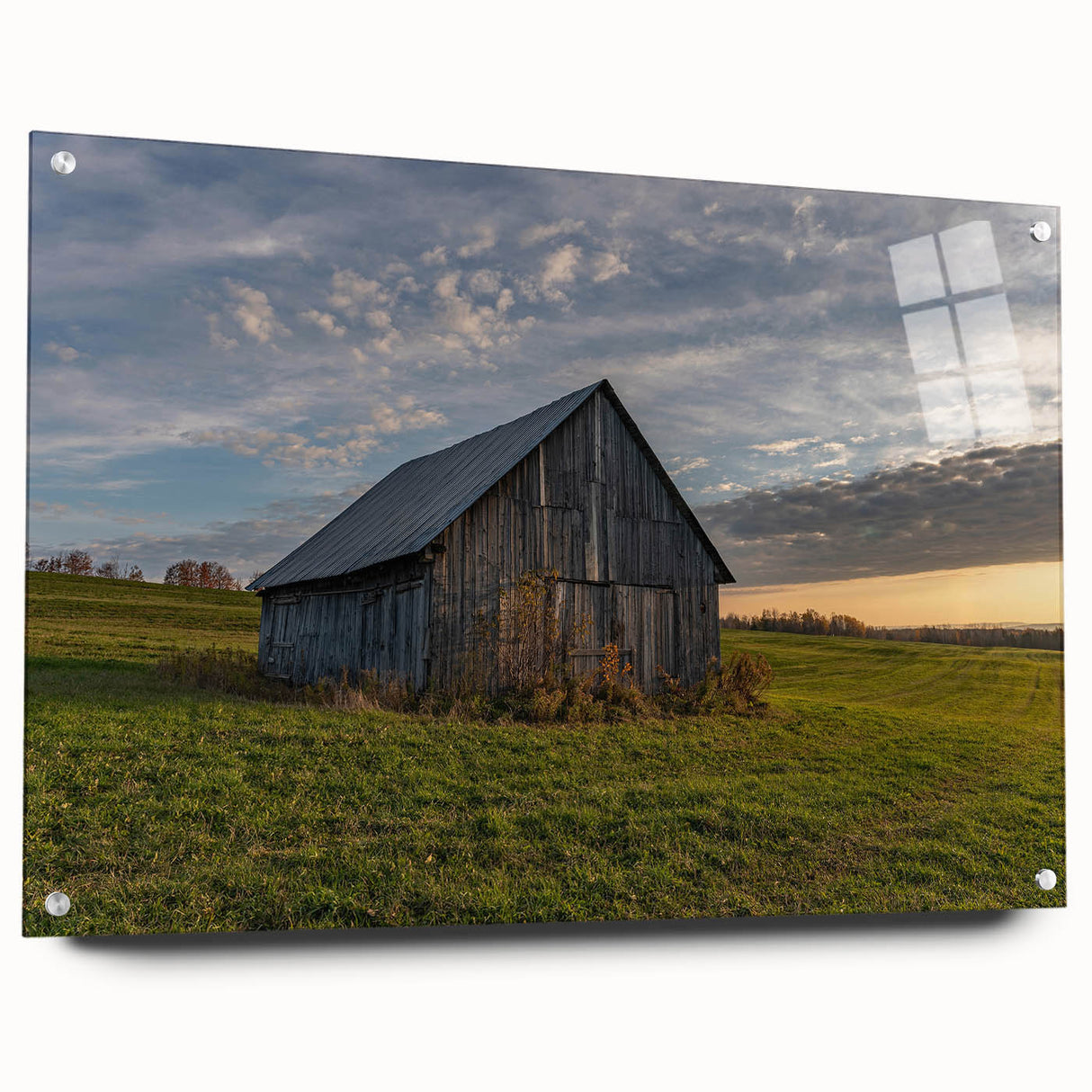Large abstract wall art on acrylic glass depicting a derelict building, in subdued gray and blue tones.
