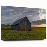 Large abstract wall art on acrylic glass depicting architectural forms in muted grays and blues.