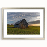 Textured abstract art print featuring a blend of gray and silver tones on a framed canvas, suitable for bedroom decor.