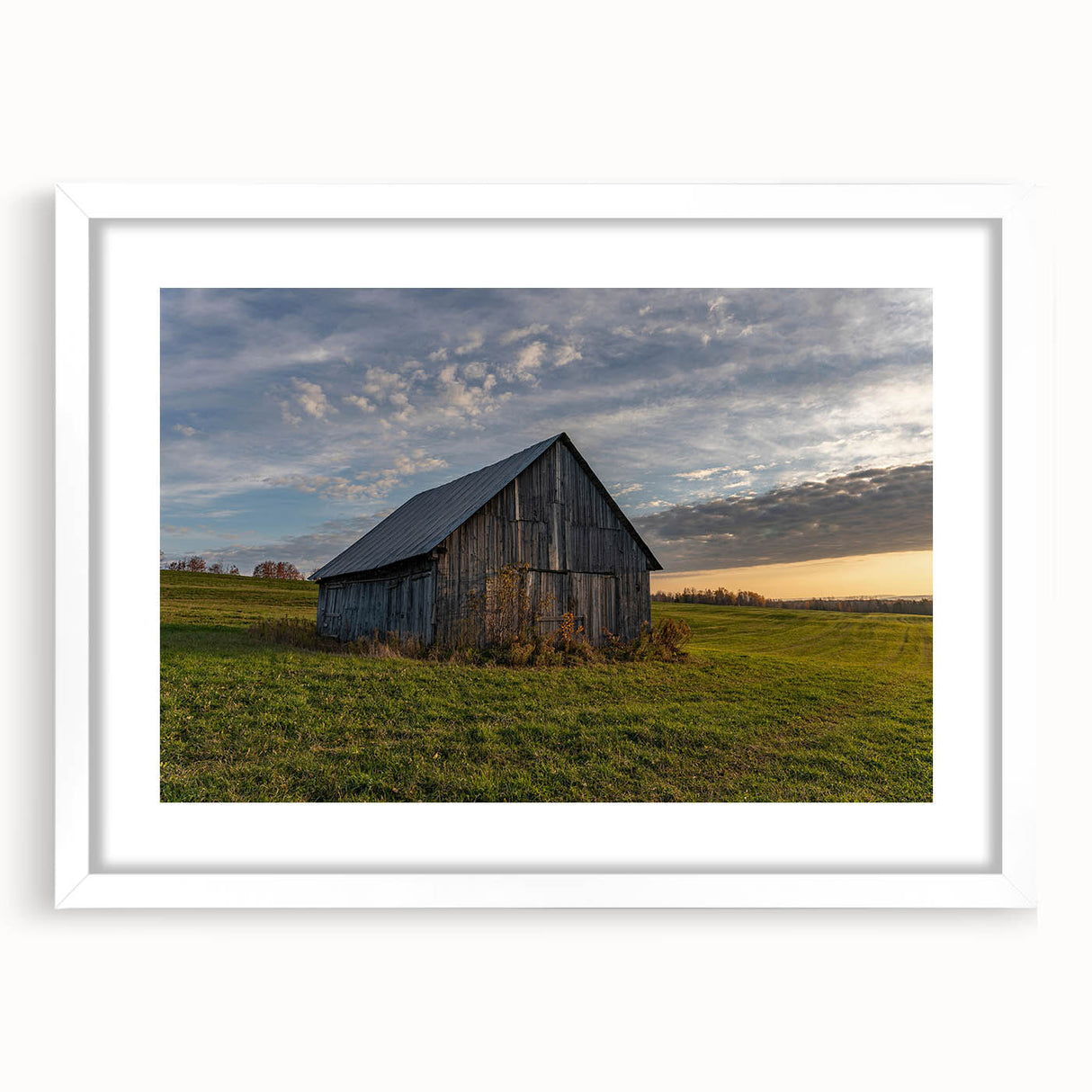 Abstract art print featuring a blend of muted gray and blue tones on a framed white canvas, suitable for dining room decor.