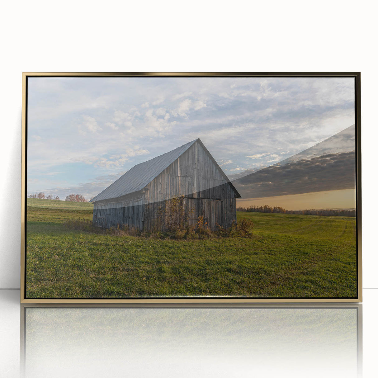 Mid-century modernist large art print of a derelict building in muted gray tones on a gold-framed acrylic.