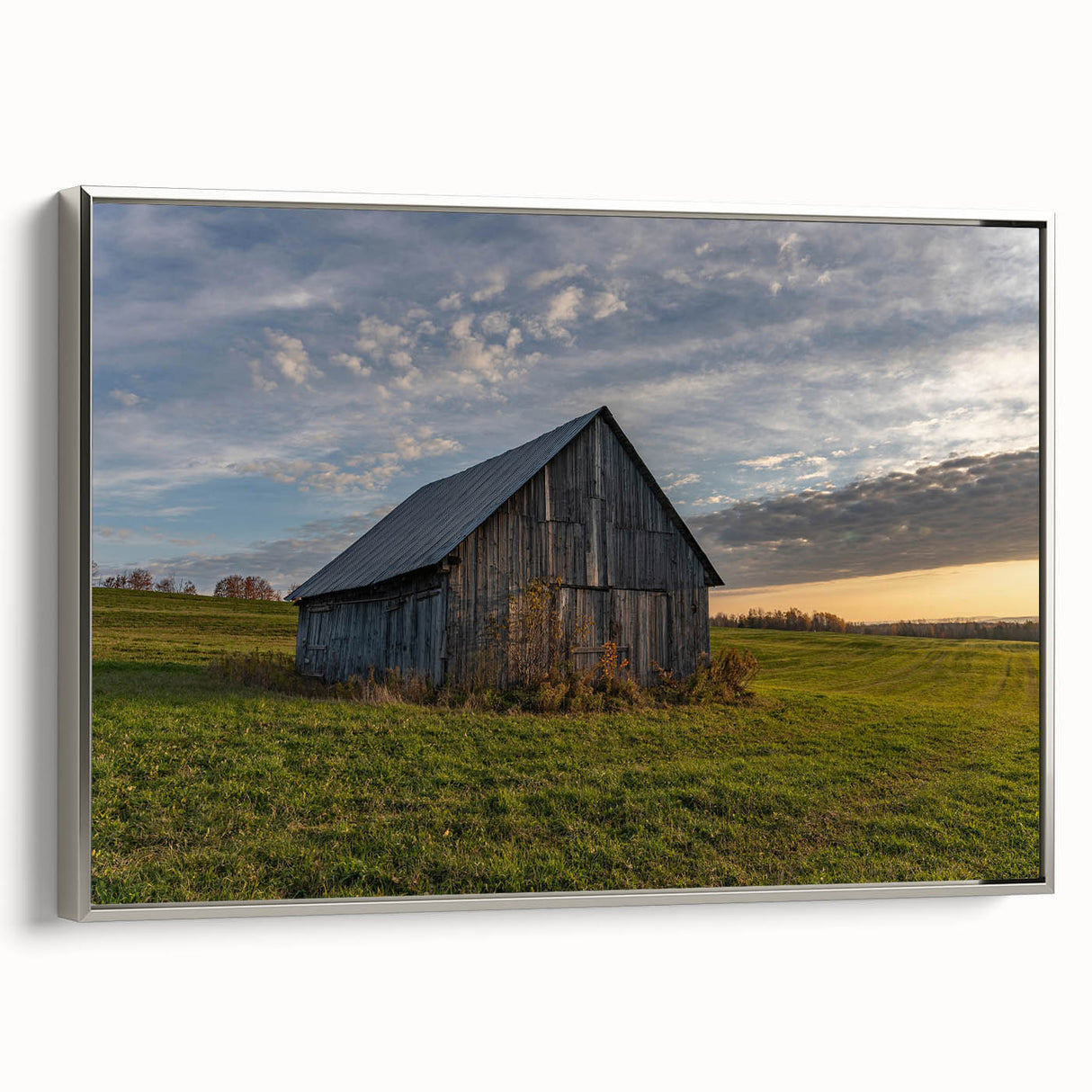 Framed canvas featuring a vintage landscape painting with muted colorful art on a black background.