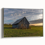 Framed canvas featuring a vintage landscape painting with muted colorful art on a black background.