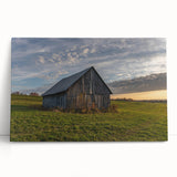 Black and white photo of a derelict building on a large stretched canvas.