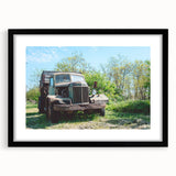 Extra large abstract art print featuring vibrant, colorful textures on a black framed canvas, ideal for living room decor.