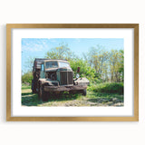 Extra large abstract art print featuring textured designs in muted earth tones, framed in gold, ideal for living room decor.