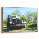 Framed canvas featuring a vintage landscape painting with muted earth tones, ideal for bedroom wall art.