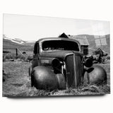 Large abstract wall art on acrylic glass depicting a derelict building in muted gray tones.