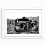 Abstract art print featuring a blend of chaotic lines in monochrome, framed in white, suitable for dining room decor.