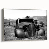 Framed canvas featuring a vintage black and colorful landscape art painting, ideal for adding character to a living room.