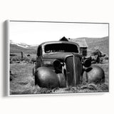 Vintage poster art of a derelict building in muted black and white, framed canvas, suitable for living room decor.