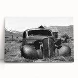 Large black and white photo of derelict buildings on stretched canvas, suited for kitchen wall art.