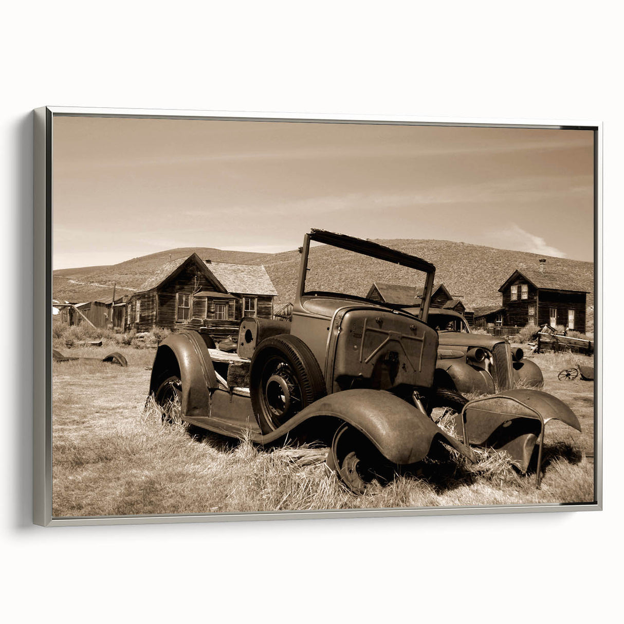 Vintage poster art of a derelict building in muted black and silver tones on framed canvas, ideal for living room decor.