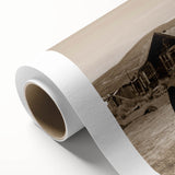 Art deco poster featuring geometric patterns in muted gold and navy, printed on rolled canvas.