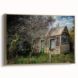 Framed canvas of a vintage poster depicting a black and white derelict building landscape, ideal for bedroom wall art.