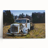 Black and white photograph of a derelict building on stretched canvas.