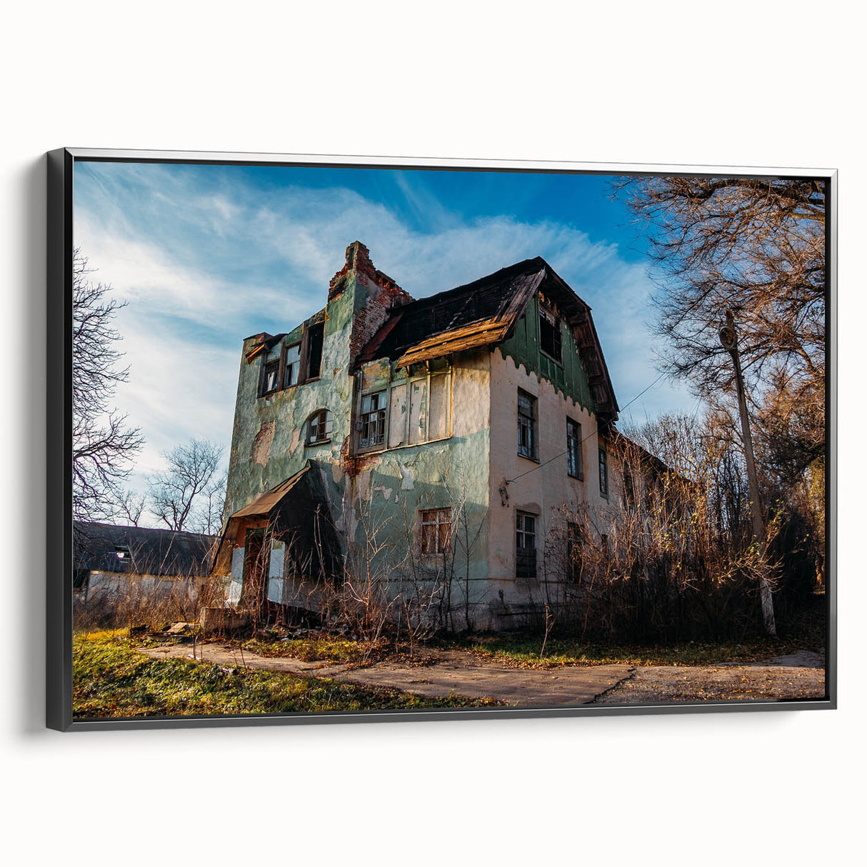 Black and white framed canvas of a vintage landscape painting, ideal for bedroom wall decor.