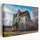 Large art print on stretched canvas depicting a derelict building, in muted gray and brown tones.