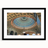 Abstract art print featuring colorful, textured domes in a large black frame, ideal for living room decor.