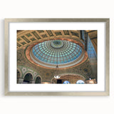 Textured art depicting abstract architectural domes in muted gray, framed in silver, ideal for bedroom wall decor.