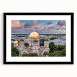 Abstract art print featuring colorful, textured domes on a black framed canvas, ideal for living room decor.
