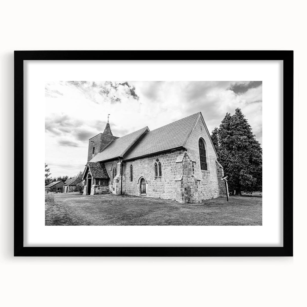 Abstract art print featuring colorful, textured domes, presented in a large black frame with mat.