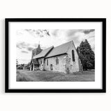 Abstract art print featuring colorful, textured domes, presented in a large black frame with mat.