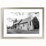 Textured abstract art print of architectural domes in muted earth tones, framed with a silver mat, suitable for bedroom art.