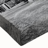 Large art featuring black and white landscape paintings of domed structures on stretched canvas.