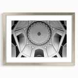 Textured abstract art print featuring overlapping domes in muted silver tones, framed with a mat in a silver frame.