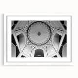 Abstract art print featuring geometric domes in muted gray on white framed canvas, suitable for dining room decor.