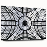 Large abstract wall art featuring multicolored geometric shapes on acrylic glass, suitable for bedroom or dining room decor.