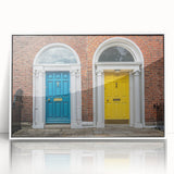 Large art print of a mid-century modernist door design in muted earth tones on a white acrylic frame.