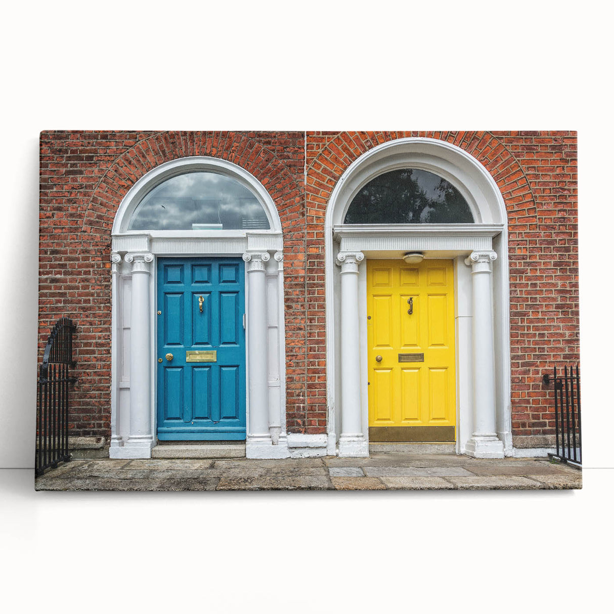 Black and white photo of a detailed architectural door design on a large stretched canvas, ideal for kitchen wall art.