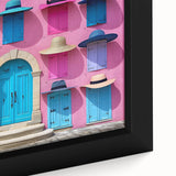Black wall art featuring a close-up of a textured door design in vibrant colors on a large framed canvas.