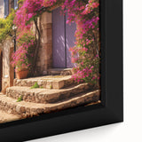 Close-up of a black framed canvas featuring a textured door design in vibrant, colorful art.