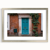 Abstract art print of a geometric doorway design in silver and gray tones, framed with mat, suitable for dining room decor.