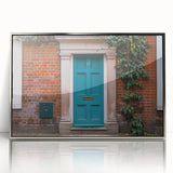 Art deco poster featuring a silver framed acrylic print of a stylized architectural door, in muted metallic tones.