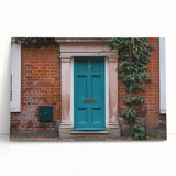 Black and white photo of a large, ornate door on stretched canvas, ideal for kitchen wall art or bedroom ambiance.