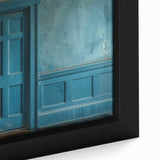 Close-up of a black framed canvas featuring a textured door design in vibrant colors, ideal for living room decor.