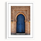 Extra large abstract art print of a textured door design in muted earth tones, framed with a white mat.