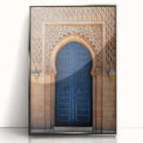 Art Deco poster featuring a silver-framed acrylic print of a geometric door design in muted gray.