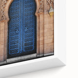 Close-up of black wall art featuring a textured door design in vibrant colors on a framed canvas.