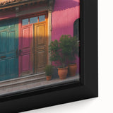 Close-up of a black framed canvas featuring a colorful, textured door design, ideal for extra large living room wall art.