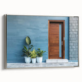 Vintage poster art of a colorful, ornate door design on a silver-framed canvas, ideal for living room decor.