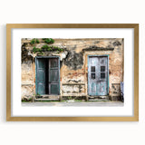 Textured abstract art print featuring a detailed door design in muted gold and cream tones on a framed canvas.