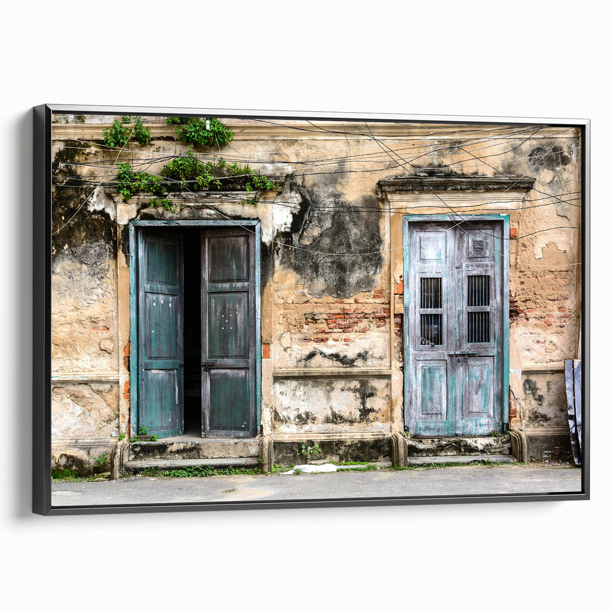 Black and white wall art featuring a vintage poster-style landscape painting on a framed canvas, suitable for bedroom decor.